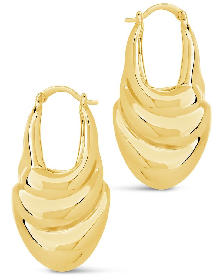 Introducing Manon Hoops, the epitome of elegance and sophistication. Crafted with unique textured hoop earrings, these statement pieces elevate any outfit. Channel your inner fashionista and make a statement with these luxurious hoops. Material: 14K gold or rhodium plated brass Features: 1.7" hoop, 0.5" width, Lead & Nickel free, friction latch Chic Gold-tone Tarnish Resistant Hoop Earrings, Elegant Textured Gold Plated Earrings, Contemporary Small Hoop Gold Earrings, Chic Gold-tone Small Hoop Earrings, Modern Yellow Gold Hoop Earrings, Chic Gold-tone Hoop Earrings For Formal Occasions, Chic Yellow Gold Huggie Earrings, Chic Textured Gold Earrings, Textured Gold-plated Hoop Earrings