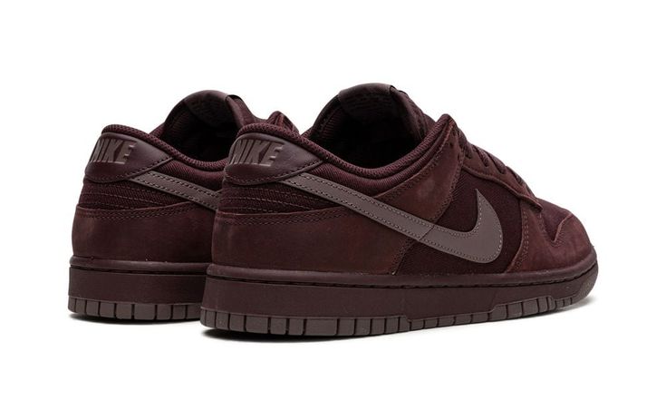 The Nike Dunk Low “Burgundy Crush” is a colorway of the retro basketball shoe made from a unique combination of materials in a monochromatic burgundy design.  The upper features a durable twill base contrasted with suede overlays, both of which appear in what Nike calls Burgundy Crush.  The leather Swoosh on either side of the shoe lightly contrasts in Plum Eclipse.  Classic “Nike” branding is found on the heel and on the tongue tag.  The shoe’s all-burgundy design continues underfoot on the mid Burgundy Design, Bape Shoes, Guys Fashion, Cooler Style, Retro Basketball Shoes, Retro Basketball, Shoe Wishlist, Shoes Outfit Fashion, Mens Casual Dress Outfits