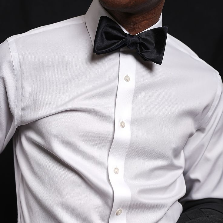 Classic, timeless and perfect for any formal evening. Choose our black satin bow tie and introduce yourself as Bond, James Bond. | Men's Tie Bar: Solid Satin Bow Tie - Self-Tie - Regular, In Black, Silk Elegant Black Slim Fit Dress Shirt, Elegant Black Dress Shirt For Semi-formal Occasions, Elegant Fitted Suit And Tie Accessories For Party, Classic Fitted Ties For Formal Occasions, Tailored Black Suit And Tie Accessories For Party, Dapper Fitted Ties For Formal Occasions, Classic Satin Tuxedo For Formal Occasions, Classic Satin Suit And Tie Accessories, Classic Fitted Satin Suit And Tie Accessories