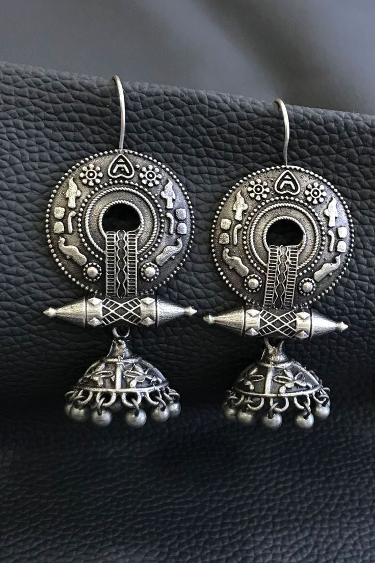 Our Rabari Earrings are handmade by artisans in Gujarat, India using brass with silver finish in an artistic tribal design from this region. Our fair trade earrings are are made with high quality materials and come in a range of beautiful designs, and showcase the fine metal craft traditions of India. Traditional Festival Plug Earrings Nickel Free, Traditional Artistic Design Drop Earrings, Round Earrings For Rituals And Festivals, Festival Earrings For Rituals, Ornate Earrings With Intricate Design For Rituals, Traditional Brass Earrings For Navratri, Traditional Artistic Design Earrings For Festivals, Traditional Earrings With Artistic Design For Festivals, Traditional Dangle Jewelry With Artistic Design