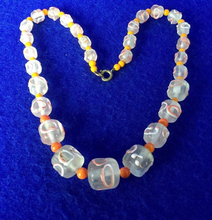 "Vintage 1950s Venetian 'Wedding Cake Beads'  Graduated Glass Bead 14\" Necklace from Murano in Clear Glass with Coral & Cream Piping and Orange Spacers A true delight.  We brought this back from  the Venetian glass making island of Murano.  We discovered this in the back rooms of a glass factory  where it may have lain in the shadows since then  We rescued it and bore it into the bright Adriatic sun. Cylindrical beads with their 'wedding cake icing sugar' striation.  14 inches long, weighing 43 Vintage Orange Necklace With Colorful Beads, Vintage Orange Round Beads Necklace, Vintage Orange Round Bead Necklace, Vintage Orange Necklace With Round Beads, Vintage Orange Hand-strung Beaded Necklaces, Vintage Orange Hand-strung Beaded Necklace, Vintage Hand-strung Orange Beaded Necklace, Vintage Hand-strung Orange Beads, Vintage Orange Beads For Gift