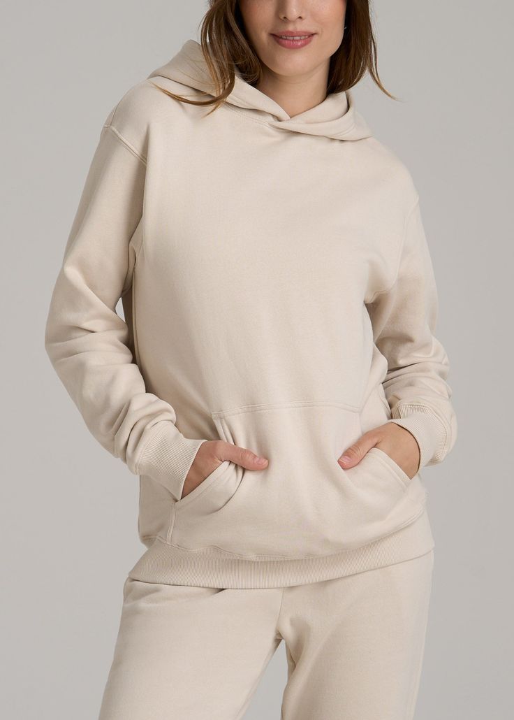 About Our Women’s Tall Sweatshirt A hoodie so cozy you’ll never want to take it off. Finding hoodies for tall women that offer the right blend of comfort and style can be difficult. A lot of women end up buying baggy men’s sweatshirts just for the added length in the body and sleeves while sacrificing on style. We want to help you relax in loungewear that actually fits, which is why we designed this women’s tall hoodie specifically for heights between 5’9” and 6’6”. It has extra-long sleeves, an Scrubs Dress, Layered Hoodie, Cozy Sleepwear, Summer Lookbook, Extra Long Sleeves, Sports Blazer, Long Sleeve Tee Shirts, Clothing Care, Tall Women