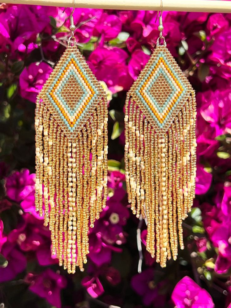 Handmade bohemian beaded fringe earrings Summer Fringe Chandelier Drop Earrings, Brown Bohemian Tassel Earrings For Summer, Bohemian Brown Tassel Earrings For Summer, Elegant Multicolor Beaded Earrings With Fringe, Summer Fringe Dangle Chandelier Earrings, Brown Bohemian Tassel Earrings, Bohemian Brown Tassel Earrings, Traditional Fringe Beaded Drop Earrings, Summer Brown Tassel Jewelry