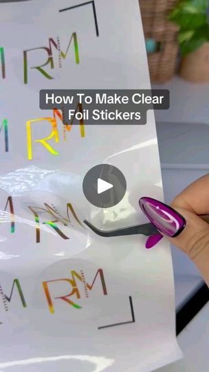 a person holding up a sticker that says how to make clear foil stickers