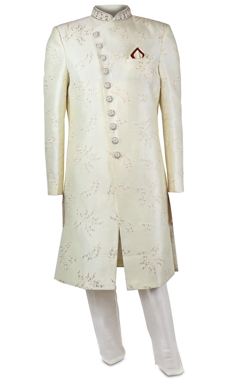 Off-White Sherwani suit is covered in delicate while, gold, and red embroidery. Elegant Kurta With Gold Embroidery And Traditional Drape, Elegant Silk Sherwani With Traditional Drape, Silk Nehru Jacket With Intricate Embroidery For Weddings, Elegant Raw Silk Nehru Jacket With Naqshi, Formal Fitted Sherwani With Pearl Embroidery, Fitted Sherwani With Pearl Embroidery For Formal Occasions, Formal Fitted Silk Sherwani, Fitted Silk Sherwani For Formal Occasions, Elegant Silk Sherwani With Resham Embroidery