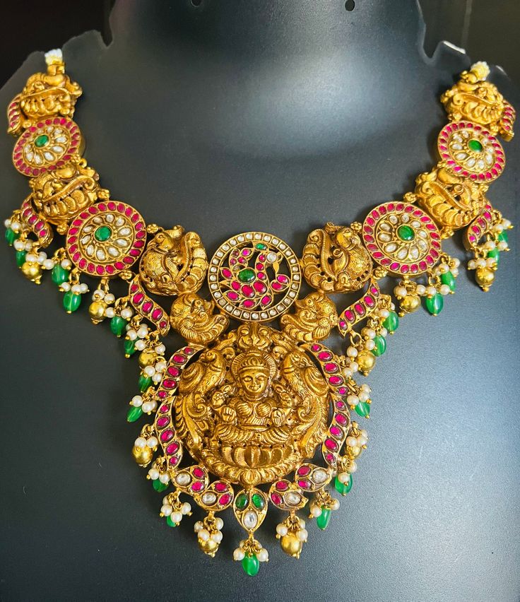 Beautiful Jadau Kundan lakshmi devi necklace with golden beads and pearl tassels. Brass based item.  Hand made. Mango Necklace, Ganesha Art, Kundan Necklaces, Temple Jewellery, Antique Finish, Chain Styles, Matching Earrings, Star Fashion, Gold Chains