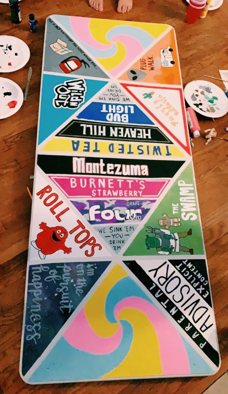 a child standing on top of a wooden floor covered in stickers and magnets