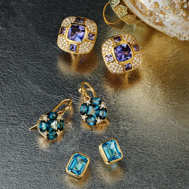 Since 1861, Gump's has been a destination for jewelry that is distinctive and timeless. We develop the design, carefully select each gemstone and oversee the production from start to finish. Featuring only the finest materials, each piece is a statement of timeless elegance. Blue Topaz 4.20ctw. Diamonds, 0.17ctw. 14-karat yellow gold. Pierced only. 7/8"L x 3/8"W.