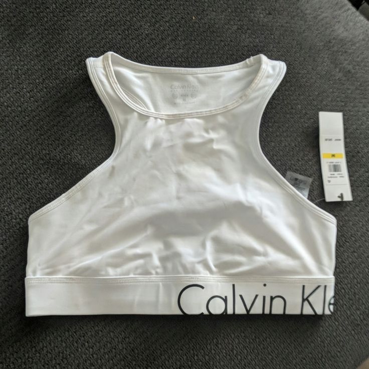 Nwt Size M See Pics For Slight Makeup Transfer Calvin Klein Sporty Activewear With Medium Support, Supportive Calvin Klein Activewear For Workout, White Fitted Tops For Light Exercise, Fitted White Tops For Light Exercise, White Top With Light Support And Stretch, White Tops For Light Exercise With Light Support, Calvin Klein Medium Support Sports Bra For Workout, White Sporty Tops With Light Support, White Light Support Sporty Top