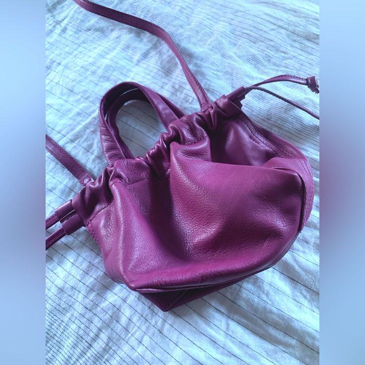 Madewell Mini The Piazza Leather Bag Crossbody. Color Rich Mauve Leather Pouch For Shopping, Trendy Leather Shopping Pouch, Crossbody Pouch With Detachable Handle, Purple Leather Bags With Removable Pouch, Purple Shoulder Bag With Detachable Handle For Everyday Use, Leather Shoulder Pouch For Shopping, Purple Leather Shopping Shoulder Bag, Purple Leather Bag With Detachable Handle, Purple Leather Shoulder Bag For Shopping