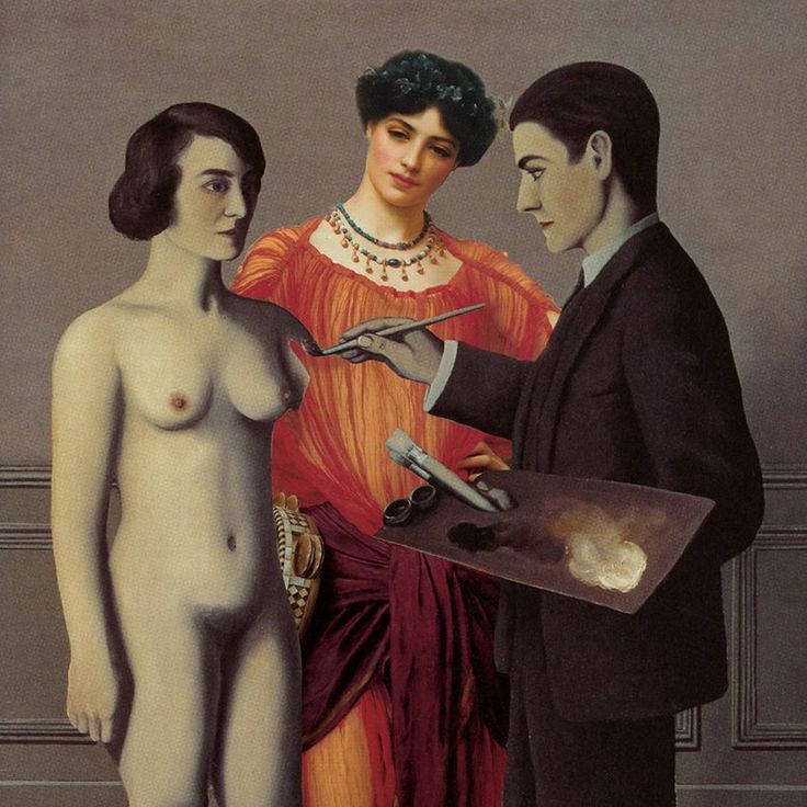 two women and a man holding a tray with something on it