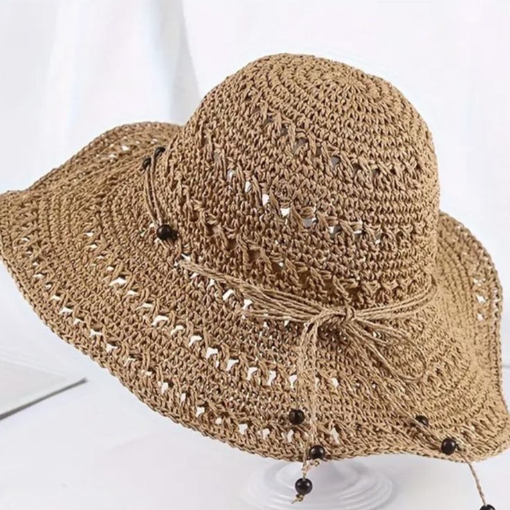 Straw Sun Hat Wide Brim Hollow Hand-Knitted And Packable Nwt Casual Lightweight One Size Hats, Casual Lightweight One-size Hats, Casual One Size Lightweight Hats, Lightweight Casual Crochet Hat For Outdoor, Casual Lightweight Crochet Fedora Hat, Solid Color One Size Sun Hat For Beach, One-size Beach Sun Hat, Casual Lightweight Crochet Hat In Brown, One Size Vacation Sun Hat