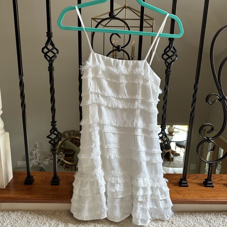 Princess Polly White Molina Dress, Nwt, Perfect Condition, Size 2, Too Small For Me White Sleeveless Tiered Dress For Day Out, White Ruffle Hem Tiered Dress For Vacation, White Tiered Dress With Ruffle Hem For Vacation, White Sleeveless Flowy Tiered Dress, White Flowy Sleeveless Tiered Dress, White Sleeveless Tiered Dress, White Tiered Sundress With Ruffle Hem, Flowy Tiered White Dress, White Ruffle Hem Mini Tiered Dress