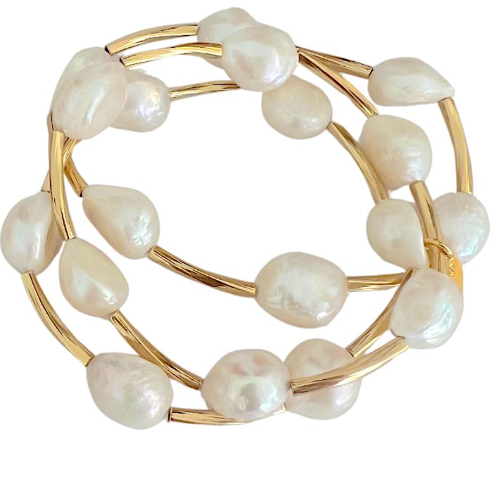 Elevate your elegance with our stunning Adina Pearl Bracelet Set, designed to make an elegant statement. Each Bracelet features 15mm lustrous Freshwater Pearls, adorned with gold-filled bars that exude timeless beauty and sophistication. 15mm freshwater pearls gold filled bars non-tarnish Elegant Baroque Pearl Bracelet, Gold Pearl Oyster Bracelet For Formal Occasions, Gold Pearl Bracelet With Pearl Charm For Formal Occasions, Gold Oyster Pearl Bracelet For Formal Occasions, Formal Gold Pearl Bracelet With Oyster Design, Elegant Formal Baroque Pearl Bracelets, Elegant Formal Baroque Pearl Bracelet, Luxury Gold Pearl Bracelet With Pearl Chain, Gold Pearl Drop Bracelet