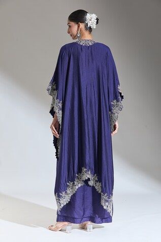 Purple asymmetric hem cape with floral zardozi embroidered borders. - Aza Fashions Evening Kaftan With Dupatta, Festive Embroidered Kaftan With Cape Sleeves, Silk Cape Kaftan, Embroidered Kaftan With Cape Sleeves For Party, Party Kaftan With Embroidered Cape Sleeves, Traditional Dress With Zari Work And Cape, Traditional Kaftan With Cape Sleeves For Reception, Festive Kaftan With Dupatta Cape, Festive Kaftan With Cape Dupatta