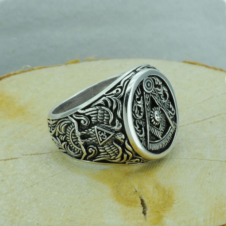 "Beldiamo 10 g Sterling Silver Past Master Masonic Symbol Ring Big Signet Freemacon Ring Gift Men Masonic Gift Jewelry * 100% polished solid sterling silver * .925 trademark stamp * Solid sterling silver weight: approx. 10 Grams, depending on the size of the ring * Measurement of ring face : 18 mm / 0.39 in x 15 mm / 0.59 in * Crafted and polished by hand * R0206-GJ-10 Fact Past Master Masonic Symbol-The Compass, Square, Sun, and Quadrant in the world. his symbol includes the Square as a reminde Symbolic Nickel-free Jewelry For Anniversary, Symbolic White Gold Stainless Steel Jewelry, Symbolic Sterling Silver Jewelry For Formal Occasions, Symbolic Hallmarked Metal Jewelry, Symbolic Stamped Ring Jewelry, Symbolic Engraved White Gold Jewelry, Symbolic Metal Jewelry For Formal Occasions, Classic Nickel-free Ring, Symbolic Adjustable Jewelry For Formal Occasions