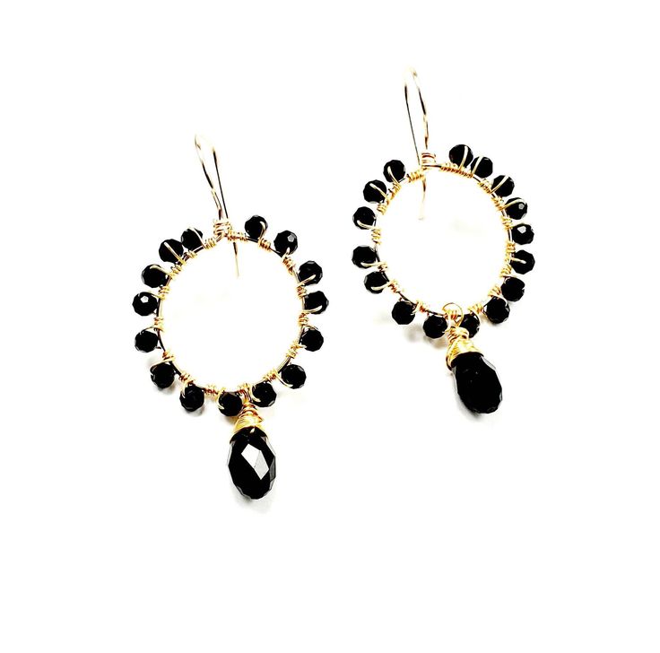 Simply beautiful these hoop earrings with drops of Black glass with gold filled wire a material that will not make you allergic or peel is very durable high quality are unique earrings designed and elaborated designed in modern women and colors In season, feel fortunate to have our exclusive collection of special earrings made for you, a unique fashionista chic woman who is always at the forefront, you will look spectacular and beautiful you will make your outfit look and shine you will be the c Modern Handmade Black Hoop Earrings, Modern Black Handmade Hoop Earrings, Modern Black Hoop Earrings For Gift, Modern Black Hoop Earrings As Gift, Nickel-free Black Small Hoop Earrings, Modern Wire Wrapped Dangle Hoop Earrings, Black Minimalist Small Hoop Earrings, Handmade Black Dangle Hoop Earrings, Black Small Hoop Earrings With Ear Wire