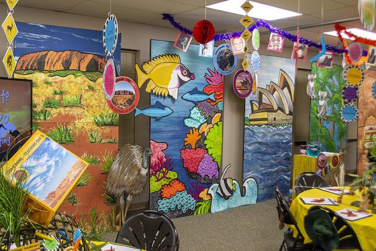 an office decorated with colorful art and decorations