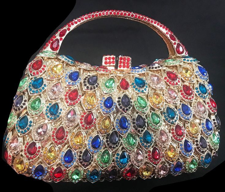 New Gold Multi Color Crystal Petal Crystal Design Evening Handbag Colors Available: Silver With Iridescent Crystal Ruby Red Pink Rose Gold With Pastel Multi Color Crystal Gold With Rain Bow Crystal Gold With Amber Crystal Elegant Multicolor Top Handle Shoulder Bag, Elegant Multicolor Formal Bags, Luxury Multicolor Handheld Clutch, Multicolor Party Pouch Bag, Multicolor Clutch Bag For Formal Occasions, Multicolor Pouch Bag For Party, Elegant Multicolor Top Handle Bag, Elegant Multicolor Satchel Bag, Elegant Multicolor Shoulder Bag For Shopping