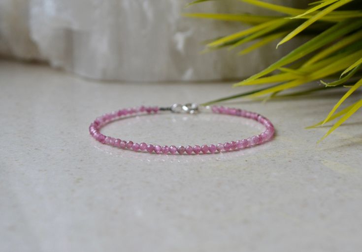 "Natural Pink Tourmaline Bracelet is perfect for Heart Chakra Bracelet. A gorgeous bracelet of precious pink tourmaline finished with a Sterling Silver clasp. Wear this bracelet on its own or stack it with your other favorite bracelets to create your own story. This bracelet is dainty, delicate and sparkly. . ❗️Sign up to our Newsletter and get 15% OFF your order (copy this link to browser search) - https://forms.gle/R74xLdL1MSmC9Apn6 ❗️ . MEASUREMENTS: Gemstones: Pink Tourmaline Beads size: 2mm Delicate Pink Round Bracelets, Dainty Pink Round Bracelet, Pink Faceted Bracelets As Gift, Dainty Pink Bracelets With Gemstone Beads, Dainty Pink Gemstone Bead Bracelets, Pink Sapphire Bracelet As A Gift, Dainty Pink Gemstone Beads Bracelet, Create Your Own Story, Bracelet Chakra