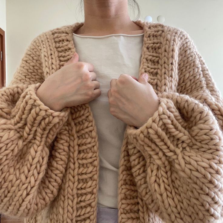 Super soft and comfortable to wear. Hand knit with pure wool 5WP, 1,200-1,300 grams Approx Size: Width 29-30"                         Length 21 " P.s. Model wearing cardigan is 5'3 / 104 lbs. Made to order takes 1-2 week to knit and shipping. I am happy to knit custom sweater if you would love to have other colors or design, just feel free to message me! Care: hand wash in cold water not over 30 degree, lay flat to dry. Beige Knitted Wool Sweater Coat, Beige Wool Knitted Sweater Coat, Beige Merino Wool Sweater Coat For Winter, Beige Merino Wool Long Sleeve Sweater Coat, Beige Long Sleeve Merino Wool Sweater Coat, Beige Merino Wool Sweater Coat For Fall, Knitted Merino Wool Sweater Coat For Fall, Beige Wool Knitted Cardigan, Chunky Knit Merino Wool Knitting Pattern For Fall