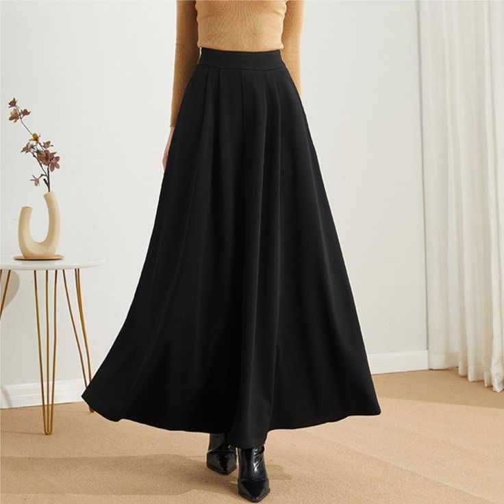 "★★ FEATURES * Polyester long skirt * Two side seam pockets * Right zipper closure * pleated detail * Plus size full skirt * A Line Skirt * Perfect for Winter, autumn, spring * Dry clean ★★ The model is 170 cm (5′ 7″) tall with a 80 cm (31.5\") bust, 66 cm (26\") waist. She is wearing the skirt in size XS. ★★ Bespoke Order Service If you Request other color Request the length Your height is not between 155 cm- 172 cm Your weight is over 75 kg I can do it for you, It will need some extra fee depe Chic A-line Winter Bottoms, Winter A-line Solid Color Bottoms, Winter A-line Bottoms In Solid Color, Black A-line Maxi Skirt For Winter, Casual Full Skirt Bottoms For Winter, Elegant A-line Bottoms For Winter, Elegant Non-stretch Full Skirt Bottoms, Solid High Waist Skirt For Fall, Non-stretch Full Length Skirt For Winter