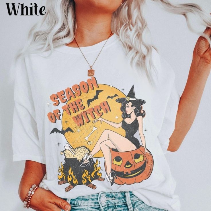 Season Of The Witch Shirt Funny Vintage Halloween Tshirt Explore Our Latest Collection Of Gildan 5000 T-Shirts, Combining Style, Versatility, And Exceptional Comfort! These T-Shirts Are Available In Sizes S To 3xl And Come In A Variety Of Vibrant Colors, Including Black, White, Sand, Green, Sport Grey, Red, Navy, And More. Made From Premium Materials, They Offer A Soft, Luxurious Feel And All-Day Comfort. Designed To Be Durable, They Maintain Their Shape And Color Even After Frequent Wear And Wa Halloween Streetwear Tops With Logo Print, Halloween Logo Print Tops For Streetwear, Halloween Crew Neck Tops With Logo Print, White Short Sleeve Spooky T-shirt, Crew Neck Tops With Logo Print For Halloween, Fall Logo Print Short Sleeve T-shirt, Fall Short Sleeve T-shirt With Logo Print, Casual Halloween T-shirt With Logo Print, Halloween Crew Neck T-shirt With Logo Print