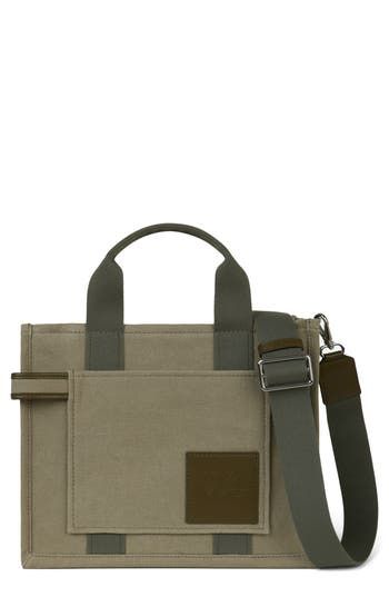 Signature logo detailing distinguishes a roomy tote crafted in a structured silhouette of durable cotton canvas and trimmed with leather. Top zip closure Top carry handles; removable, adjustable crossbody strap Exterior slip pocket Interior zip and wall pockets Structured silhouette with flat base for stability Textile with leather trim Imported Khaki Canvas Satchel With Double Handle, Versatile Canvas Satchel With Top Carry Handle, Modern Canvas Shoulder Bag With Top Carry Handle, Versatile Canvas Satchel With Detachable Strap, Modern Canvas Bag With Top Handle, Versatile Canvas Satchel With Adjustable Strap, Modern Top Handle Canvas Bag, Modern Canvas Crossbody Satchel, Modern Canvas Top Handle Bag