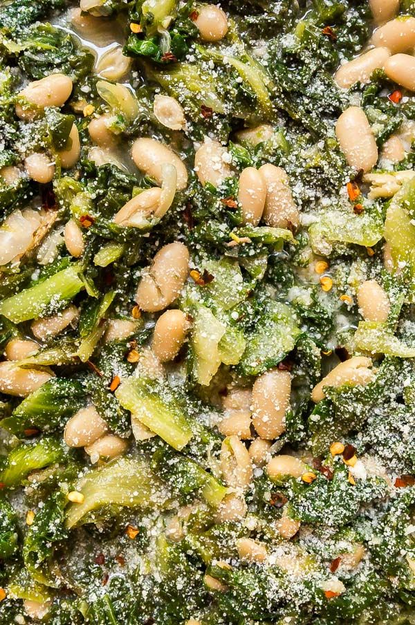 broccoli and white beans are mixed together in a dish