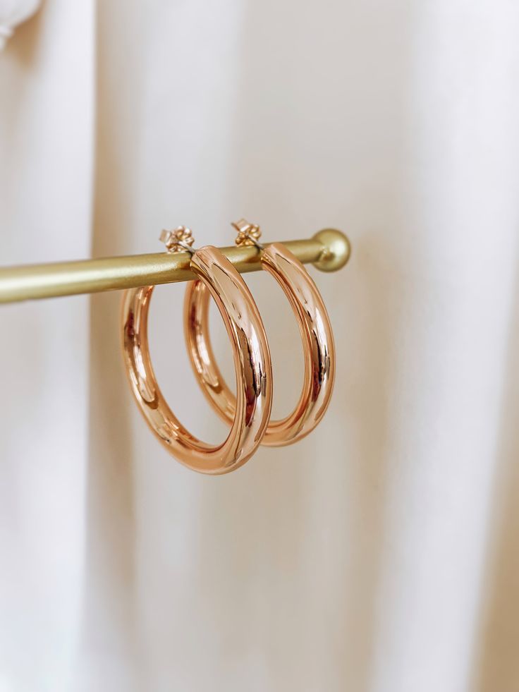 These Chunky Open hoops are another must-have in my collection. I personally wear them every day, making them lightweight and comfortable to wear. • tarnish resistance• these gold hoops are made with hypoallergenic tubing for sensitive skin. Material sterling silver, gold filled, rose gold filled Finish glossy Measures 39mm hoop diameter Hoop thickness 5mm *ADDITIONAL INFORMATION* These earrings have been created by hand so no two pieces are identical. Each pair will vary in the exact size, shap Everyday Rose Gold 14k Hoop Earrings, Everyday Rose Gold Tarnish Resistant Hoop Earrings, Everyday 14k Rose Gold Hoop Earrings, Everyday Tarnish Resistant Rose Gold Hoop Earrings, Hypoallergenic Rose Gold 14k Hoop Earrings, Tarnish Resistant Rose Gold Huggie Hoop Earrings, Everyday Tarnish-resistant Rose Gold Hoop Earrings, Tarnish-resistant Rose Gold Huggie Hoop Earrings, Hypoallergenic Rose Gold Hoop Earrings In 14k Gold