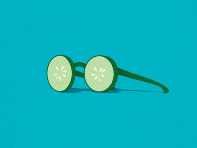 two slices of cucumber on a blue background