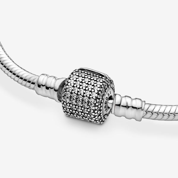 The classic Pandora charm bracelet is given a glamorous upgrade with this sparkling pavé version. Crafted from sterling silver, this sleek snake chain bracelet features a barrel clasp set with sparkling cubic zirconia stones. Wear it solo or as a sophisticated carrier for your personal collection of Moments clips and charms. - Pandora Moments Sparkling Pavé Clasp Snake Chain Bracelet - Sterling silver / Cubic Zirconia / Clear - Sz. 17 cm Royal Chain, Snake Chain Bracelets, Pandora Charm, Custom Pendants, Magnetic Bracelet, Royal Jewelry, Engraved Necklace, Pandora Jewelry, Jewelry Rings Engagement