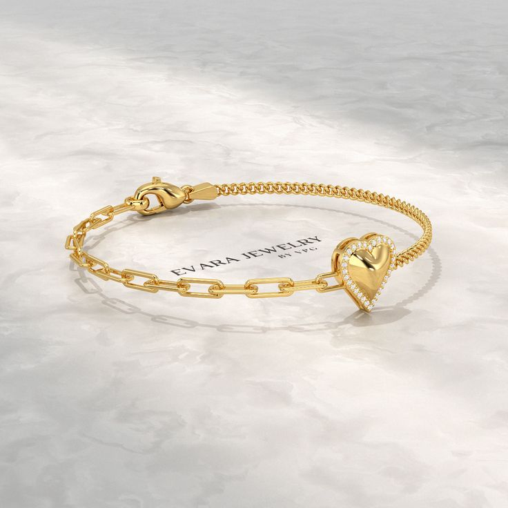 Introducing our exquisite Dainty Diamond Heart Paperclip & Cuban 50-50 Bracelet. Crafted from gleaming 10K, 14K, or 18K gold, this bracelet embodies elegance and durability. Its intricate paperclip design, adorned with a sparkling diamond heart, adds a touch of shimmer to your everyday look. Perfect for minimalist jewelry enthusiasts, this bracelet can be personalized with an engraved message, making it a cherished keepsake. Its versatile style complements both casual and formal attire, making i Gold Diamond Heart Charm Bracelet, Gold Diamond Heart Cut Bracelets, Gold Heart Shaped Diamond Bracelet, Gold Diamond Bracelet With Heart Charm For Anniversary, Heart Cut Diamond Bracelet For Wedding On Valentine's Day, Heart Cut Diamond Bracelet For Valentine's Wedding, Gold Diamond Heart Cut Bracelet, Heart Cut Diamond Bracelet For Wedding And Valentine's Day, Formal Fine Jewelry Heart Bracelet For Valentine's Day