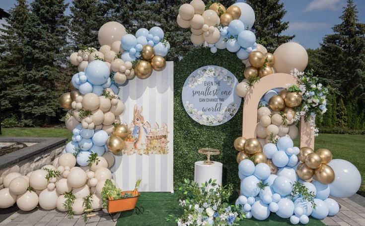 an outdoor event with balloons and decorations