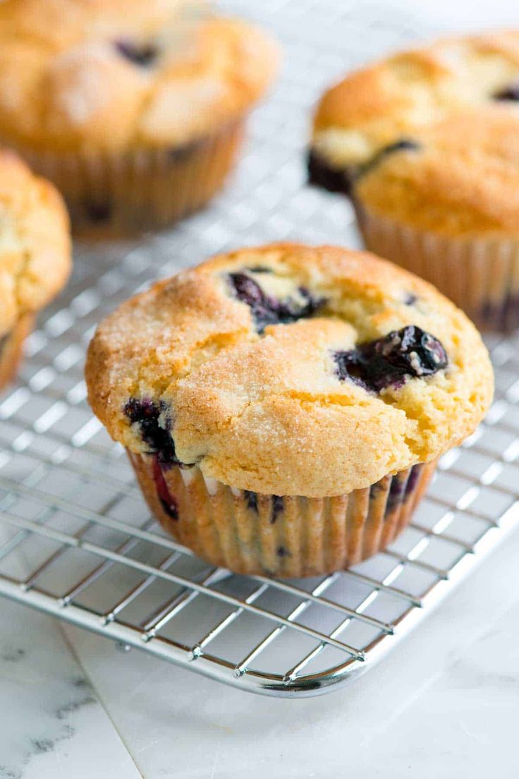 blueberry muffins cooling on a wire rack