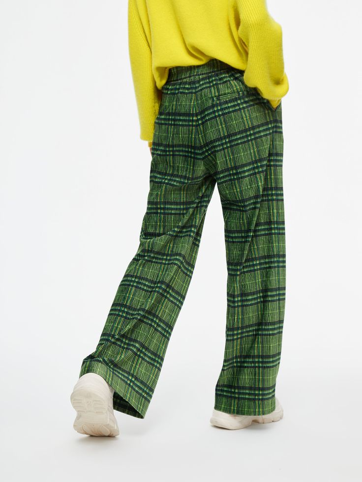 Details: Vintage vibe check trousers Wide-legged trousers with elasticated waist and straight, draped trouser shape. Plaid fabric with its own pleats. Materials & Care: Polyester Fiber 100% Hand wash | Dry clean Do not bleach Size & Fit: Model is 5'7", Bust 32, Waist 24, Hips 35, wearing a size S Item #: LL3PA12 Relaxed Fit Plaid Pants With Elastic Waistband, Plaid Relaxed Fit Pants, Plaid Relaxed Fit Trousers, Relaxed Fit Plaid Trousers, Plaid Straight Pants With Relaxed Fit, Plaid Relaxed Fit Straight Pants, Relaxed Fit Plaid Straight Pants, Check Trousers, Chic Business Casual