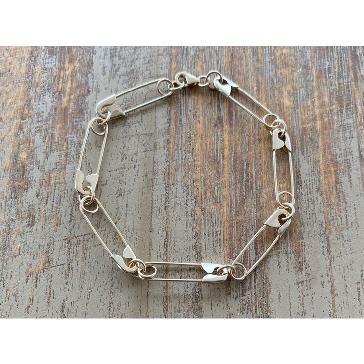 This Chain & Link Bracelets item by 24jewels has 705 favorites from Etsy shoppers. Ships from Greece. Listed on Aug 8, 2024 Safety Pin Ring Diy, Diy Silver Bracelets, Diy Safety Pin Jewelry, Diy Punk Jewelry, Safety Pin Bracelet Diy, Safety Pin Jewelry Diy, Safety Pin Fashion, Goth Bracelets, Punk Crafts