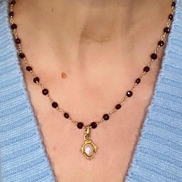 Beautifully faceted garnet coin beads necklace. Can be worn as is or with pendants. Length 16" Extender 2.75" Garnet properties is a stone of prosperity and abundance, encouraging gratitude and service to others. It is a deeply spiritual stone also known as the stone of good luck and health. It can help get rid of the negative energies and transform them to positive ones. It's a good gemstone for purification and detoxification. -This information is intended for spiritual support only- Beads 4mm Spiritual Necklace With Pearl Pendant And Round Beads, Spiritual Pearl Pendant Necklace, Red Garnet Oval Pendant Necklace, Handmade Garnet Bead Necklaces, Handmade Garnet Beaded Necklaces, Handmade Garnet Necklaces With Round Beads, Garnet Necklaces With Faceted Beads For Gifts, Garnet Bead Necklaces For Gifts, Garnet Beaded Necklaces As Gift