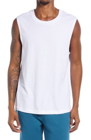 A soft and stretchy blend yields all-around performance comfort in a versatile, American-made T-shirt in a laid-back sleeveless cut. 28" length (size Medium) Crewneck Sleeveless 50% polyester, 25% cotton, 25% rayon or 52% cotton, 48% polyester Machine wash, tumble dry Imported Athleisure Cotton Tank T-shirt, Cotton Tank T-shirt For Athleisure, Cotton Crew Neck Muscle Tee For Athleisure, Basic Sleeveless Moisture-wicking Top, Cotton Sleeveless Athleisure Muscle Tee, Cotton Sleeveless Muscle Tee For Athleisure, Cotton Tank Tops Athleisure Style, White Cotton Muscle Tee Athleisure, Cotton Tank Top For Gym