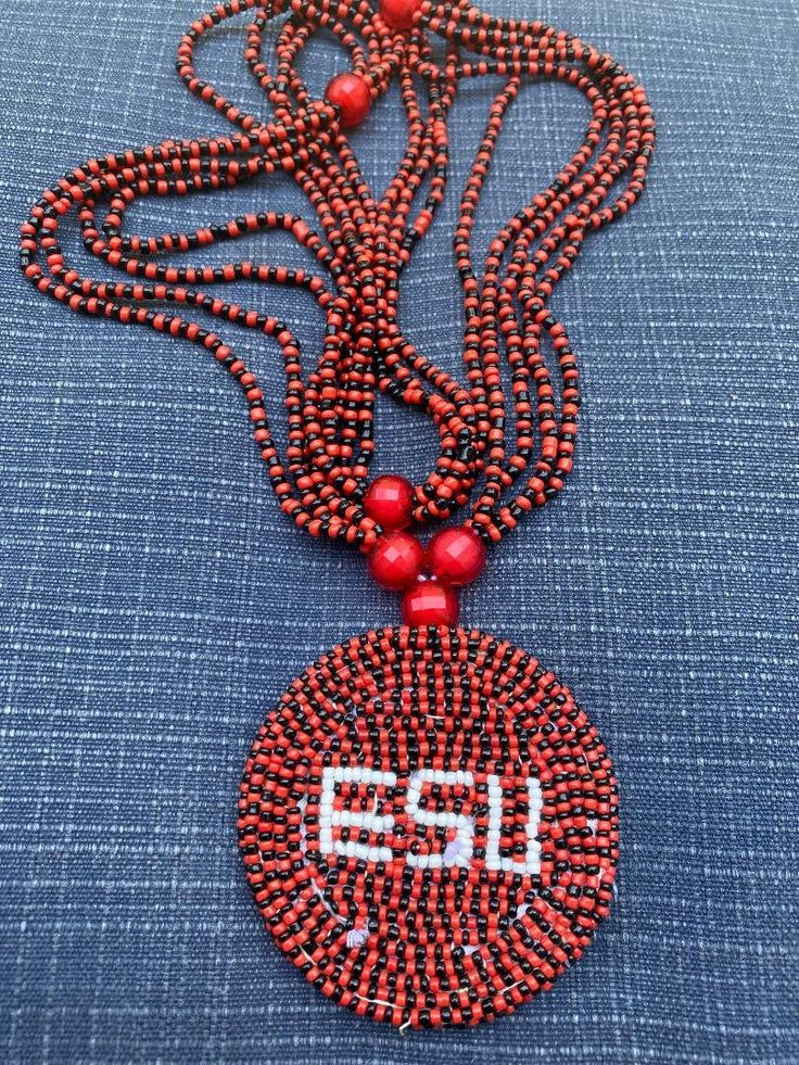 Two Beaded Ileke Esu To Choose From Spiritual neck piece for Esu 32 inches beaded neck wear for Olokun worship, sacrifies and celebrations. Ask me about other traditional religion items such as Esu, Sango, Ogun etc. Mailed descretely. Made in Oyo Traditional Hand-strung Beaded Necklaces As Gift, Hand-strung Beaded Necklaces As Festival Gifts, Festive Hand-strung Beaded Necklaces As Gifts, Traditional Hand-strung Pendant Beaded Necklaces, Traditional Wooden Beaded Necklaces For Festivals, Festive Spiritual Beaded Necklaces With Large Beads, Festive Spiritual Large Beaded Necklaces, Festive Large Beads Spiritual Necklace, Festive Large Beaded Spiritual Necklaces