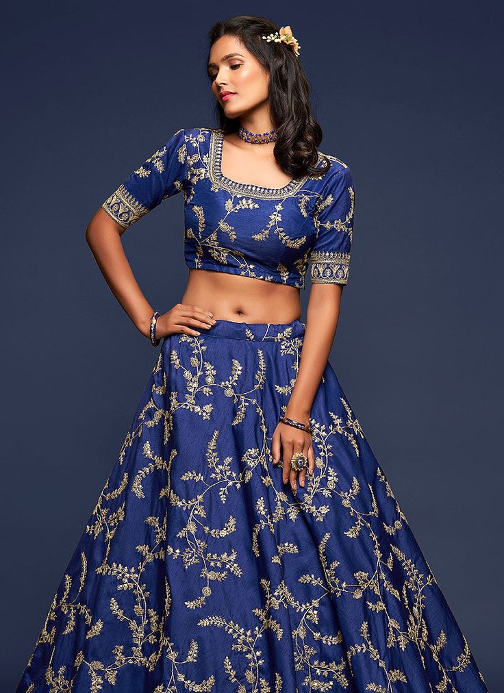 Dark Blue Zari Embroidered Silk Lehenga Choli will make you look more beautiful on this wedding season with indian ethnic essence. This set comprises of traditional zari, resham dori, stone and beads work on art silk lehenga with can can detailed satin lining paired with all over equally embellished art silk blouse. The beauty part is it’s zari border and butti embroidered soft net dupatta. Style this set with heels and golden jewellery to look stunning with all bridal drama. This set comprises Reception Meenakari Dola Silk Choli, Meenakari Raw Silk Choli For Saree, Anarkali Choli With Meenakari On Dola Silk, Anarkali Choli In Dola Silk With Meenakari, Banarasi Silk Meenakari Choli For Reception, Raw Silk Meenakari Choli For Receptions, Navratri Meenakari Dola Silk Sets, Reception Meenakari Kundan Choli, Reception Kundan Meenakari Choli