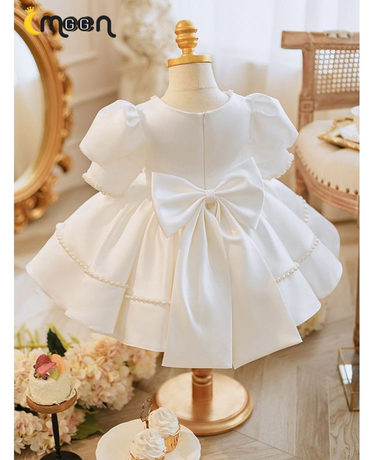 Get 10% off now! Buy elegant white satin ruffled flower girl dress with beading pearls at cheap price online. Free stable shipping and pro custom service since 2009. Princess Style White First Communion Dress With Ruffles, White Ruffled Princess Dress For First Communion, White Princess Dress With Ruffles For First Communion, Elegant Ruffled Pageant Dress For First Communion, Satin Ruffle Dresses For Baptism, White Princess Dress With Pearl Embroidery, White Ruffled Pageant Dress For First Communion, Satin First Communion Dress With Satin Bow, First Communion Satin Dress With Satin Bow