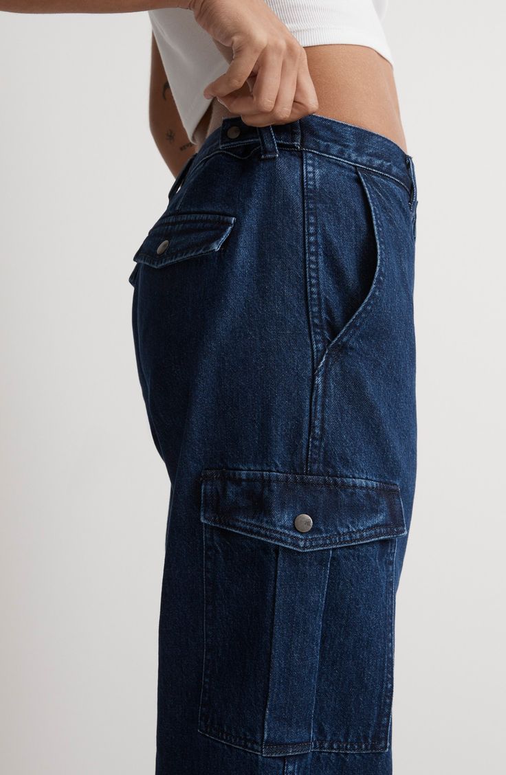 Designed to be slung low, these slouchy straight-leg jeans have workwear-inspired cargo pockets. Blended with recycled cotton, the denim has old-school character with zero stretch. Zip fly with button closure Front slant pockets; back button-flap pockets; cargo flap-patch pockets 95% cotton, 5% recycled cotton Machine wash, tumble dry Imported Urban Straight Leg Cargo Jeans With Pockets, Casual Cargo Jeans With Patch Pockets And Straight Leg, Urban Straight Leg Cargo Jeans, Denim Blue Tapered Leg Cargo Pants, Straight Leg Cargo Jeans With Flap Pockets For Streetwear, Baggy Dark Wash Straight Leg Cargo Pants, Baggy Straight Leg Dark Wash Cargo Pants, Urban Tapered Leg Cargo Jeans, Baggy Denim Bottoms With Flap Pockets