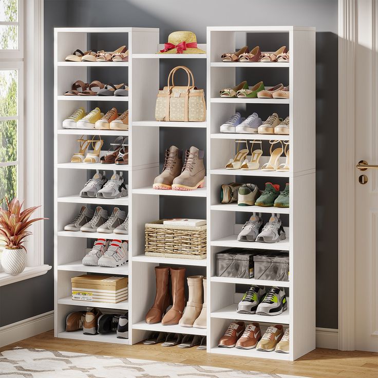 a white bookcase filled with lots of shoes