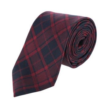 The Kincade Red Blackwatch Plaid Silk Necktie will add a distinguished pop of color to any outfit this holiday season. Done in a classy blackwatch plaid with a modern twist, this necktie will grab people's attention and add the finishing touch to your formal attire. The exceptional quality of the Kincade necktie will encourage you to wear it as often as you can throughout the year. The Kincade Collection is a stylish and effortless way to put together an entire look. Be sure to check out the mat Elegant Plaid Suit And Tie Accessories For Business, Classic Burgundy Ties For Business, Classic Plaid Business Suit And Tie Accessories, Formal Black Suit And Tie Accessories For Winter, Plaid Suit And Tie Accessories For Business, Elegant Fitted Winter Tie, Classic Plaid Suit And Tie Accessories For Work, Classic Winter Business Suit And Tie Accessories, Classic Plaid Ties For Formal Occasions