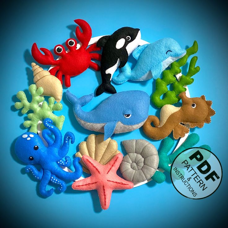 an assortment of sea animals on a blue background