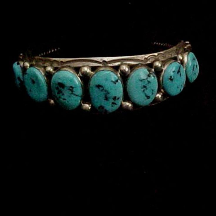 This Men's Turquoise Cuff By H. Jin Is Truly A Beautiful Piece As The Stones Taper A Bit Smaller From The Center Stone. The Inner Measurement Is Approx 6” With A 1 1/2” Gap. Itweights Approx. 53.5 Gr. As With All My Jewelry, Unless Stated, This Is New Never Worn. Please Note That I Only Communicate Through Poshmark And Will Not Respond Via Private Text Or Emails. I Thank You For Your Interest And Hope You Will Follow Me As I Have So Many More Items That I Will Be Listing. Classic Handmade Turquoise Bracelets, Classic Turquoise Adjustable Bracelet, Classic Adjustable Turquoise Cuff Bracelet, Turquoise Bangle Cuff Bracelet For Formal Occasions, Turquoise Bracelet Cuff, My Jewelry, Turquoise Cuff, Mens Accessories Jewelry, I Thank You