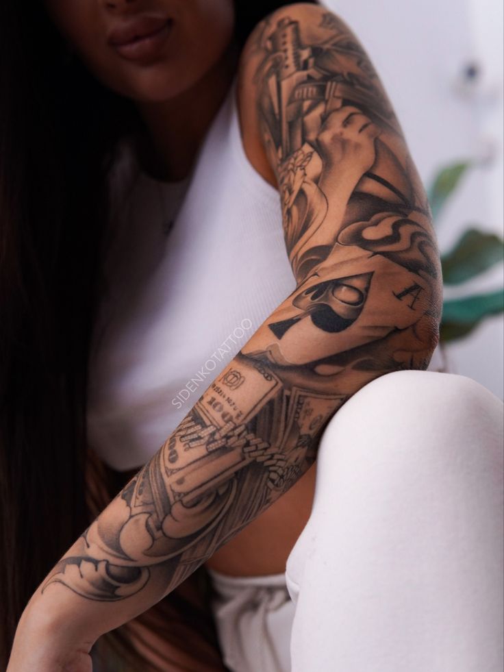 a woman with a tattoo on her arm