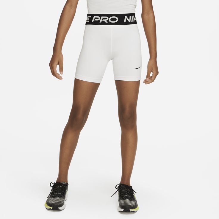 Play and feel like your favorite athlete when you pull on the Nike Pro shorts. Super stretchy fabric hugs your body, so you can feel confident in all sports—from the courts to the outdoor fields. Pro tip: You can wear them alone or underneath your game shorts. It's up to you. Nike White Shorts, White Athletic Shorts With Built-in Shorts For Gym, Nike Sporty Athletic Shorts For Training, White Athletic Shorts For Running, White Short Length Athletic Shorts For Running, Nike Sporty Training Shorts, Functional White Moisture-wicking Athletic Shorts, White Go-dry Athleisure Shorts, White Athleisure Shorts With Go-dry Technology