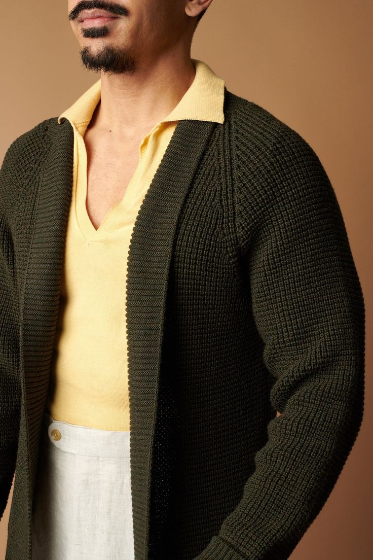 The Leo is a chunky waffle-knit shawl cardigan with a 3/4 length, raglan sleeve and patch pockets made from a beautiful Italian merino wool. Brown Merino Wool Long Sleeve Cardigan, Chic Merino Wool V-neck Cardigan, Cozy V-neck Merino Wool Cardigan, Affordable V-neck Men's Cardigan, Polo Tee Shirts, Luxury Merino Wool V-neck Cardigan, Shawl Cardigan, Polo Tees, Knit Shawl